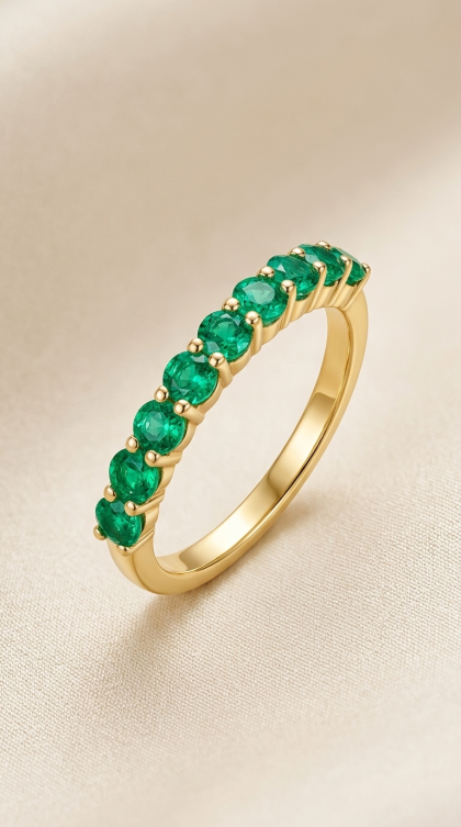 Argolla en oro amarillo 18K con Esmeraldas