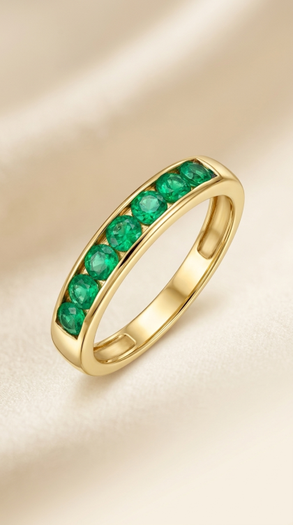 Argolla en oro amarillo 18K con Esmeraldas
