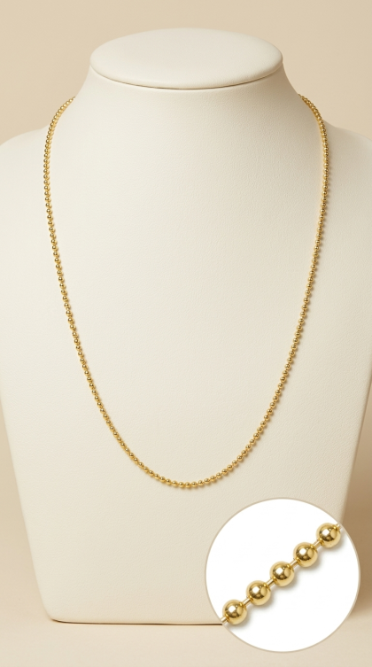 Cadena con esferas en oro amarillo 18K