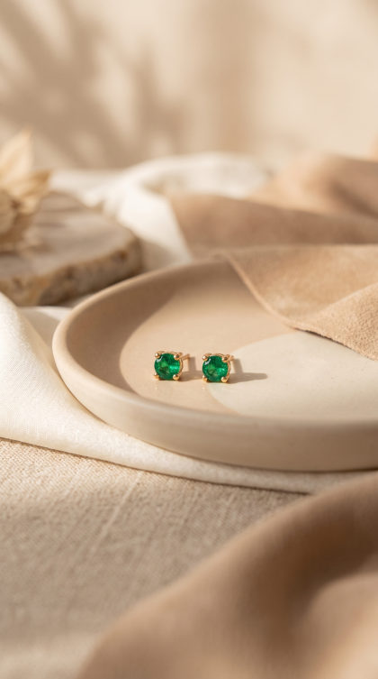 Topos en oro amarillo 18K con Esmeraldas