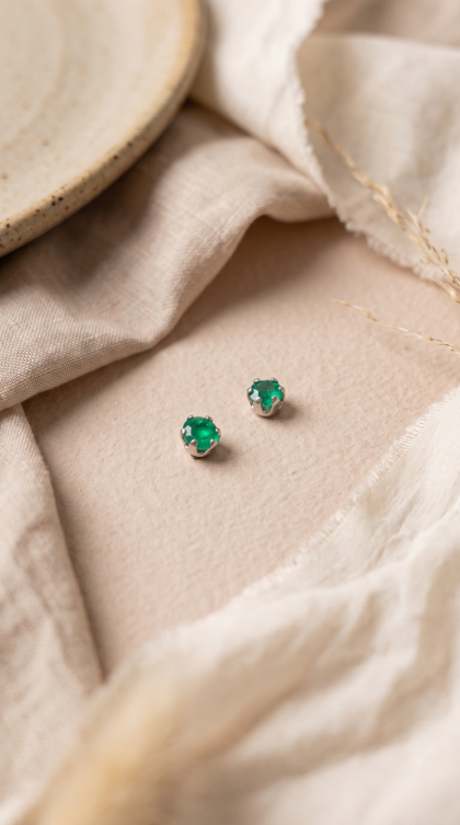 Topos en oro blanco 18K con Esmeraldas